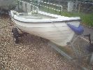 Little Auk - A nice stable boat for fishing or pleasure use with custom trailer, 4 stroke engine, oars & rowlocks.