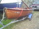 Friendship Rose - A lovely classic varnished clinker day boat with a bermudan rig, tan sails, road trailer, trolly, mast up cover, oars etc.