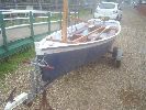 Cornflower - A "Pretty" 13ft skiff with a lug rig ( tan sails ) nice trailer trolly combo, fitted cover, buoyancy bags, Oars etc.