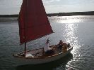 Mindy - Pretty boat built on the traditional design of the original barge dinghies. She has a lug rig, oars etc.
