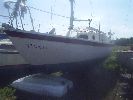 Debonair - She has cushioned berths, a chart / dining table, fitted galley, separate sea toilet, pushpit, pulpit & guardrails & various gea