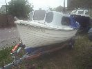Sandpiper - This sturdy fishing / pleasure boat is immaculate throughout. The 4 stroke engine was new 2 years ago & the trailer new last yea