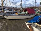 Samba - A classic long keel yacht with a modern Yanmar diesel with controls to the tiller steering, Galley with Arigo stove, porta loo e