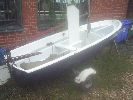 Blue Fin - An unsinkable designed dinghy with a fractional bermudan rig and road trailer.
