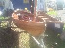 Tinkerbell - A very attractive clinker built dayboat with a single sail and road trailer.